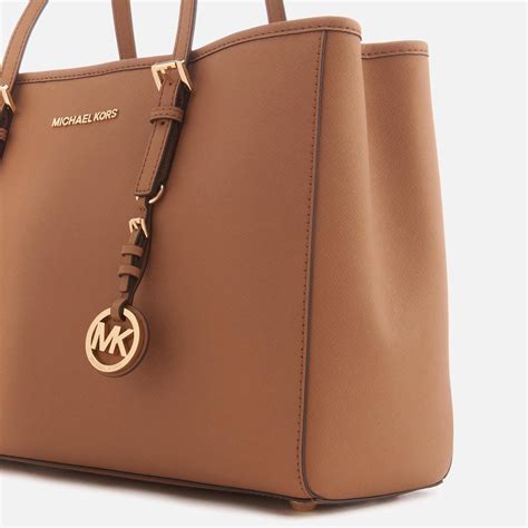 michael kors jet set travel bag brown|Michael Kors jet set airplane.